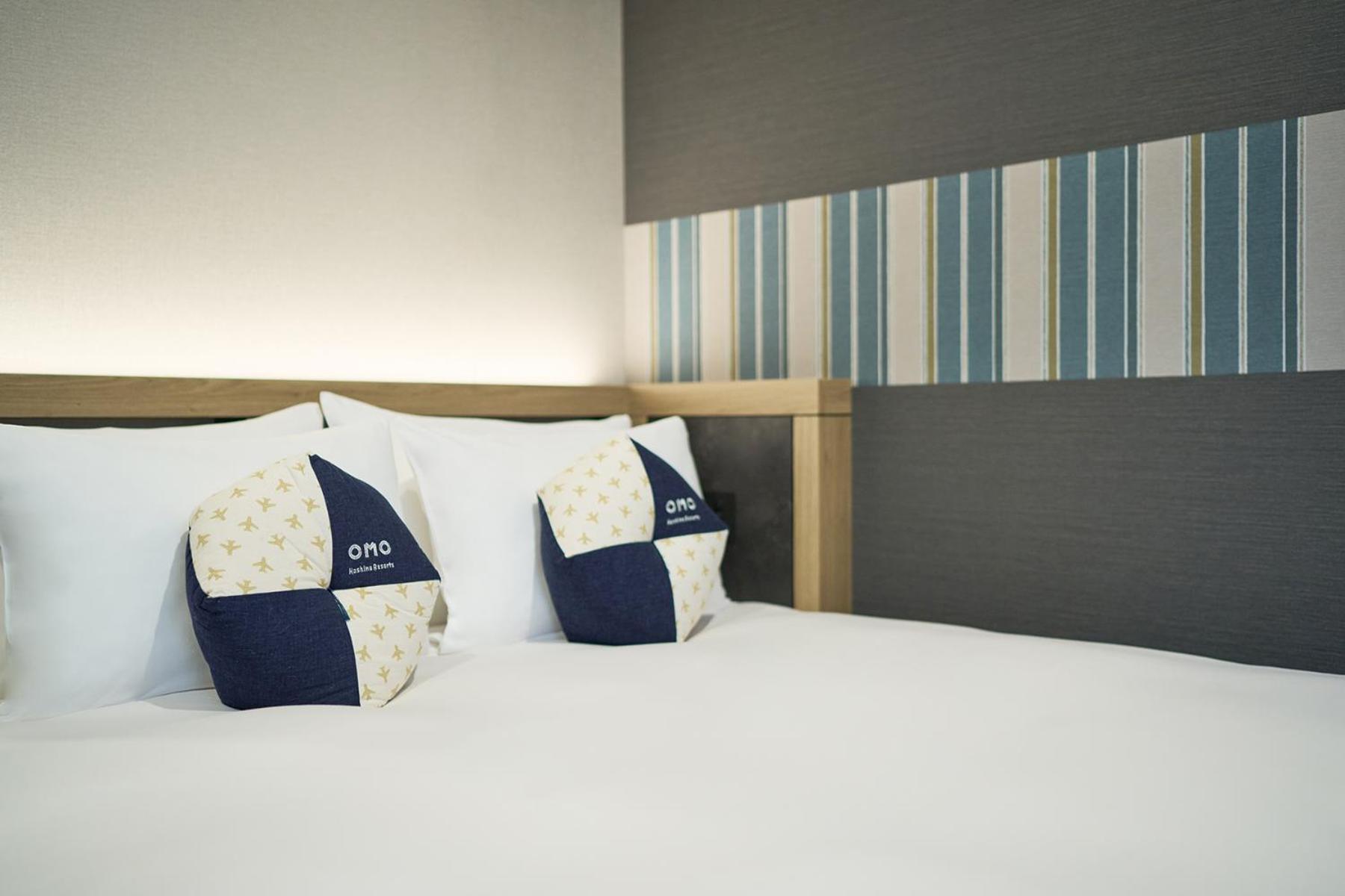 Omo Kansai Airport By Hoshino Resorts Izumisano Eksteriør bilde A bed at a hotel